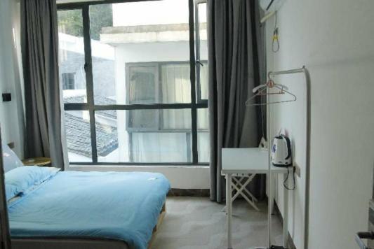 Showbiz Hostel Yangshuo Bagian luar foto